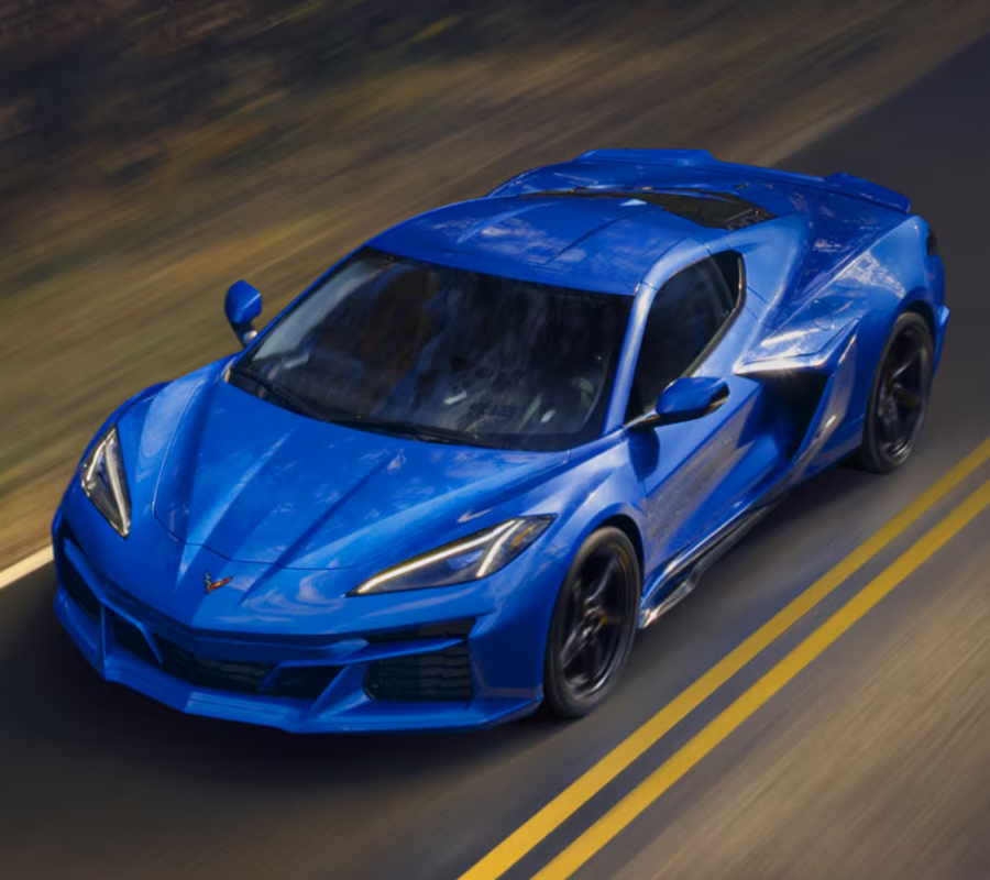 Blue Corvette E-Ray Driving on Street