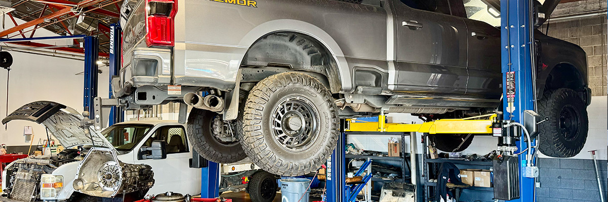 Ford truck up on lift
