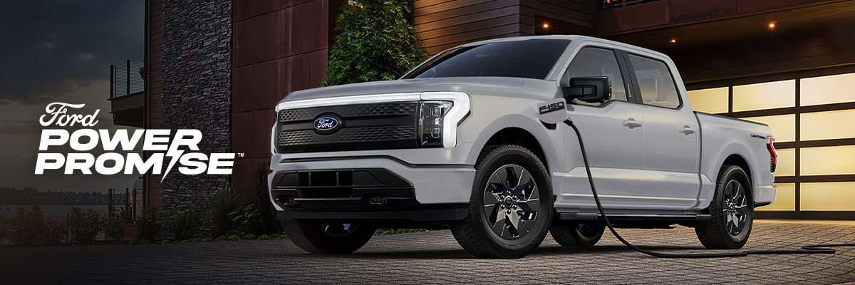 Ford Lightning being charged and Ford Power Promise logo