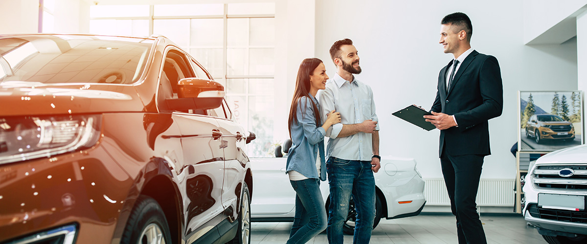 Couple at a dealership