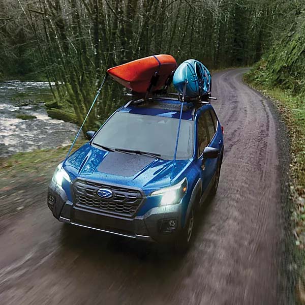 2025 Subaru Forester driving through the mud