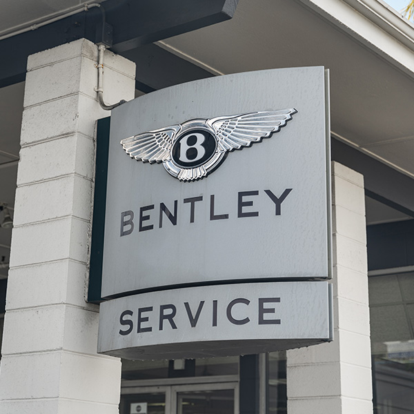 Shot of Bentley Service sign outside of dealership