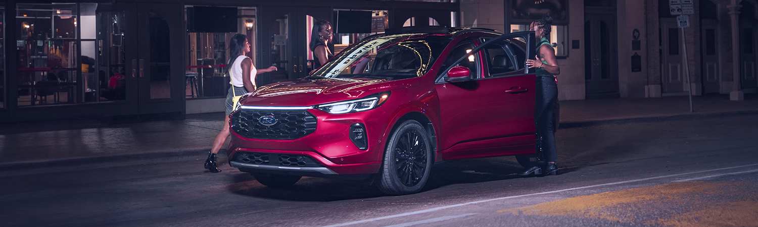 Three women getting into a 2024 Ford Escape