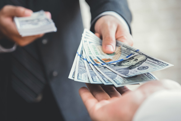 Salesperson handing over cash