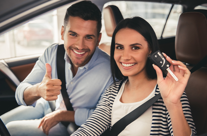 couple buying new car