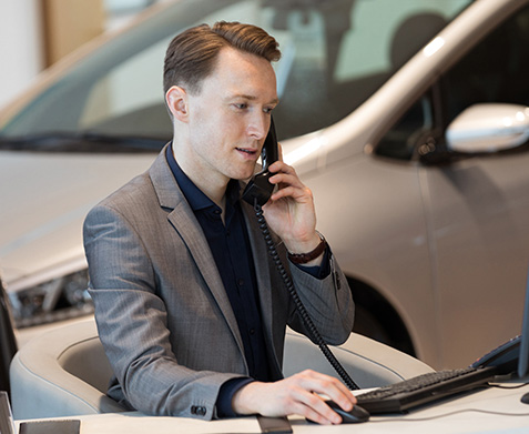 Dealer on phone