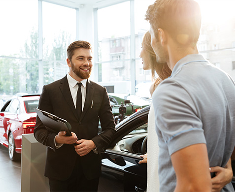 Couple at a dealership