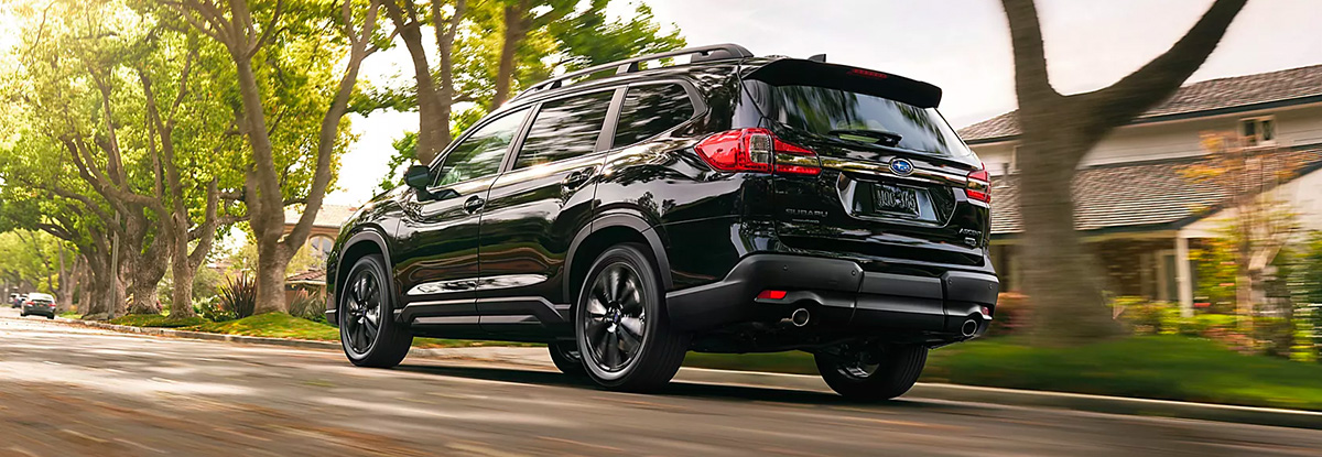 Subaru Ascent driving thorugh a neighborhood