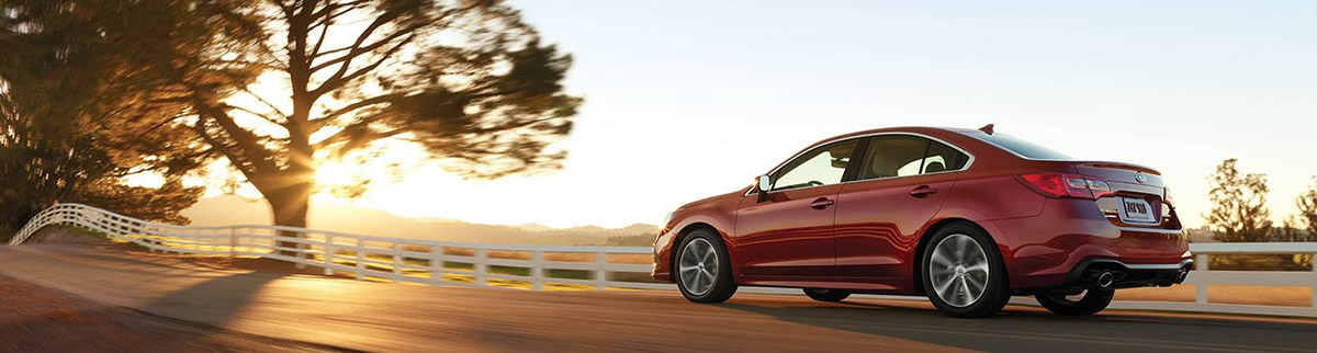 2018 Legacy 3.6R Limited Rear shown in Crimson Red Pearl