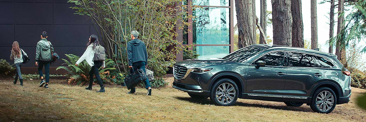 MAZDA CX-9 parked outside home