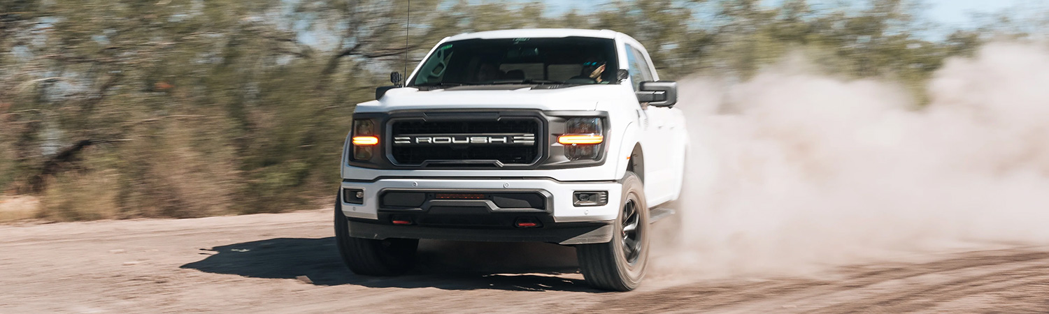 Shot of Roush F-150 drifting through dirt