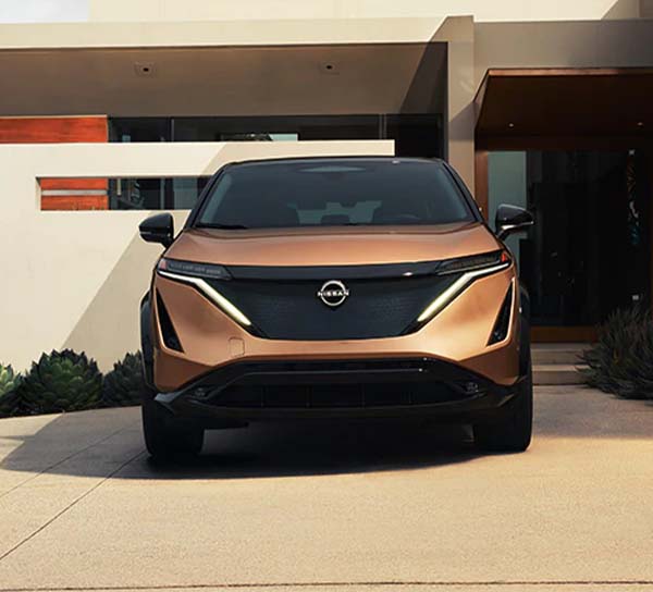 New Nissan ARIYA parked in a driveway