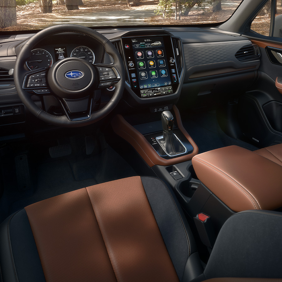 Touring interior shown in Brown Leather