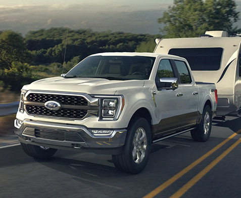A 2021 Ford F 1 50 towing a trailer