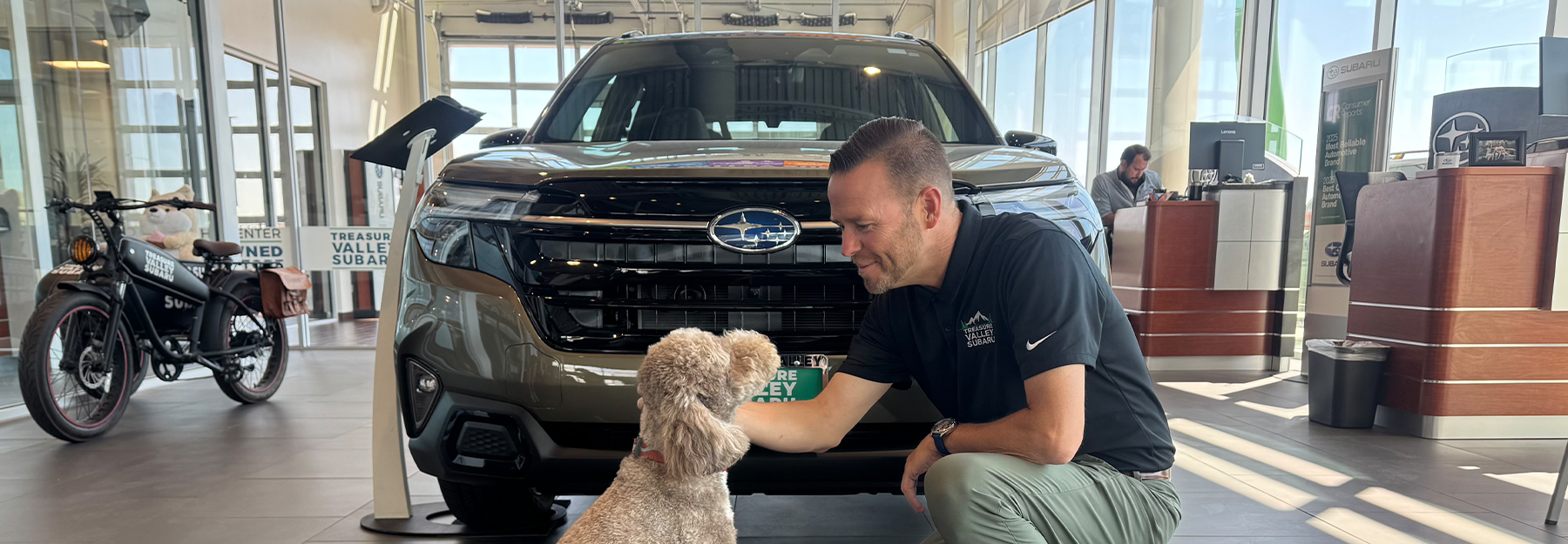 dealership employee with dog