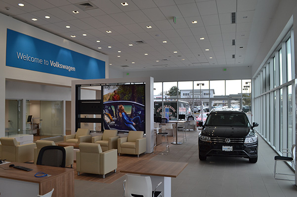 Interior shot of the main showroom floor of dealership.