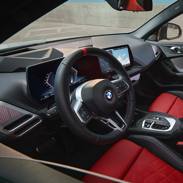 Interior shot of the 2025 BMW 2 Series Gran Coupe and its dashboard