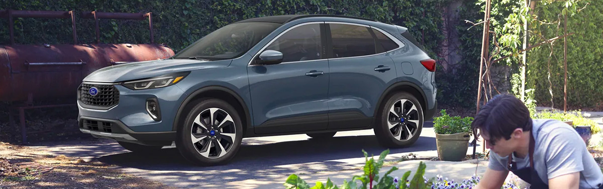 Ford Escape parked in front of gardenscape