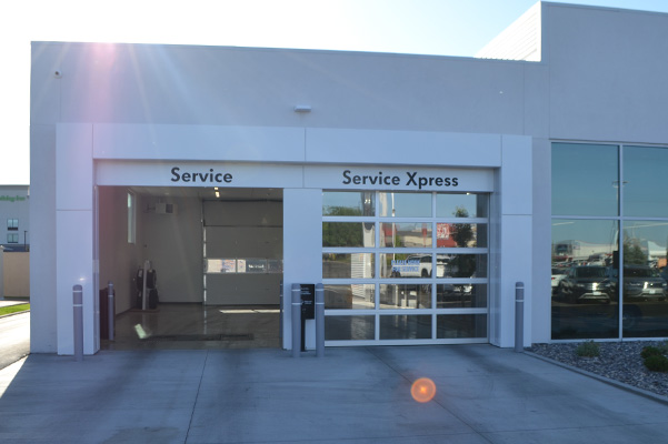 External shot of dealership service entrance.